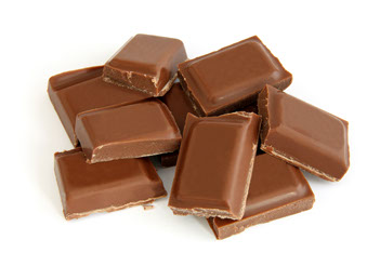 Kleine Portionen Milchschokolade,  welche in einer ausgewogenen Ernährung als Genussmittel ihren festen Platz haben.